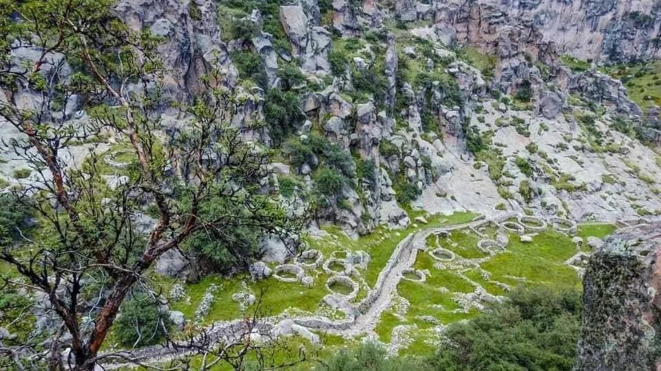 Circular enclosures of T’aqrachullo stepped along the canyon slope